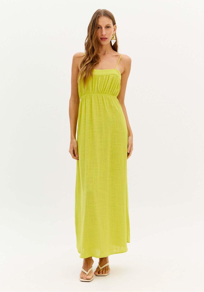 Vestido super midi linho amarelo vista frontal inteira, alças finas e saia fluida